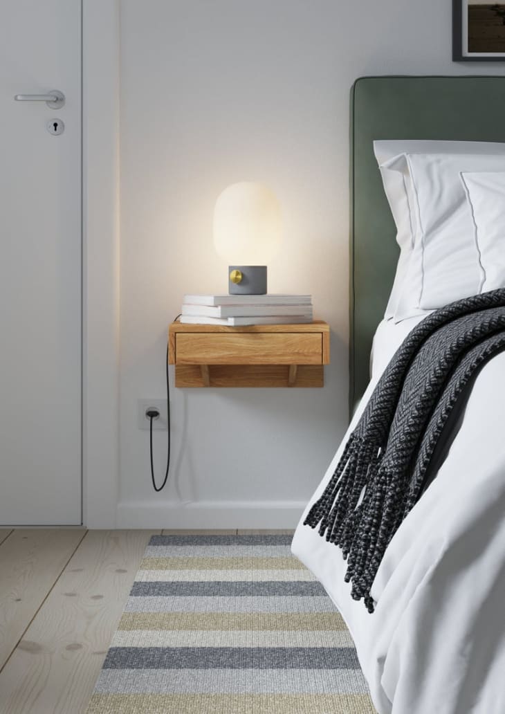 Nightstand attached to clearance wall